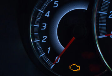 Check Engine Light visible on car dashboard.