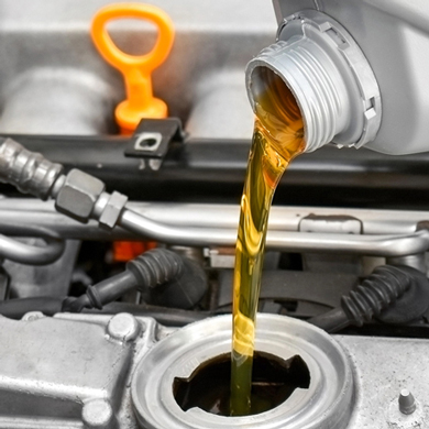 An oil change on a vehicle.